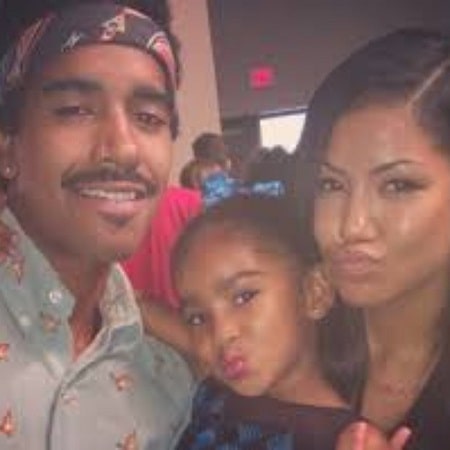 A picture of Namiko Love Browner with her dad and mom.